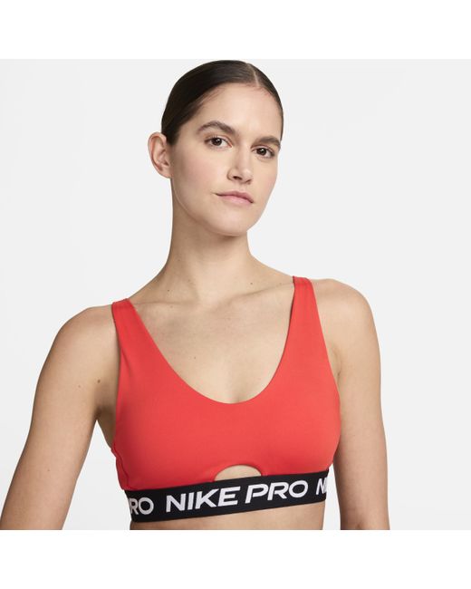 Bra imbottito a sostegno medio pro indy plunge di Nike in Pink