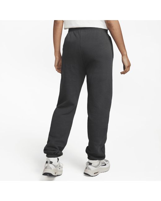 Jogger in fleece sportswear di Nike in Black