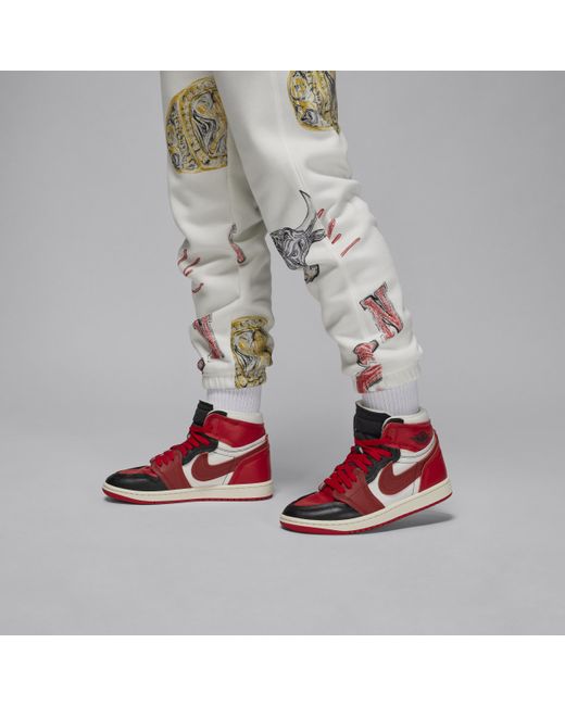 Pantaloni in fleece jordan brooklyn fleece di Nike in White
