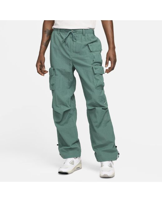 Nike Green Sportswear Tech Pack Woven Lined Pants for men