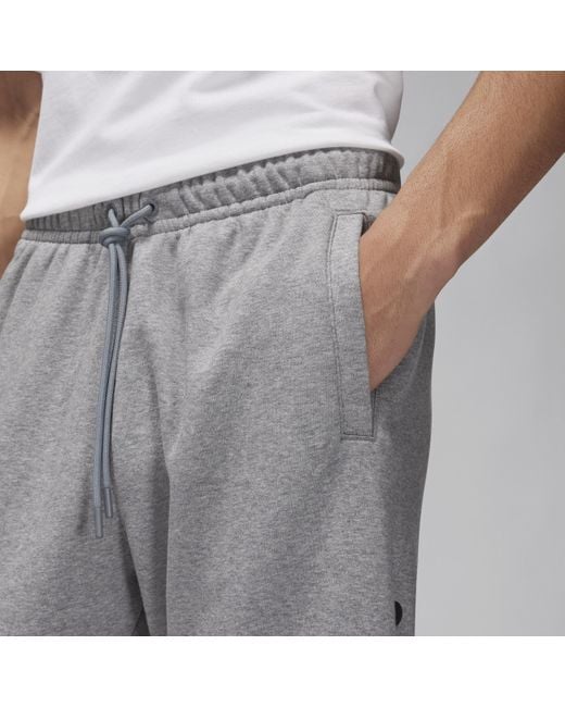 Pantaloni di base in fleece jordan essentials di Nike in Gray da Uomo