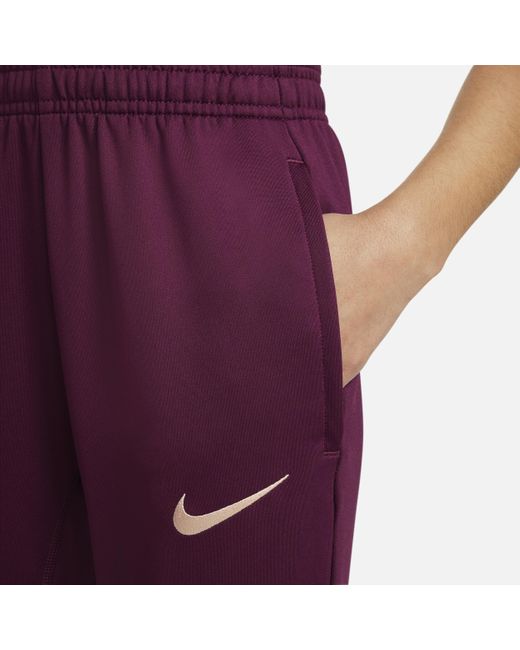 Pantaloni da calcio in maglia dri-fit paris saint-germain strike di Nike in Purple
