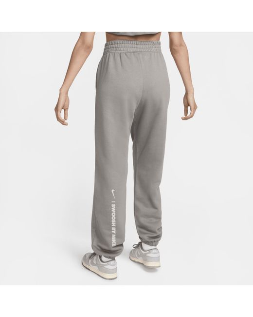 Nike Sportswear Ruimvallende Fleecebroek in het Gray