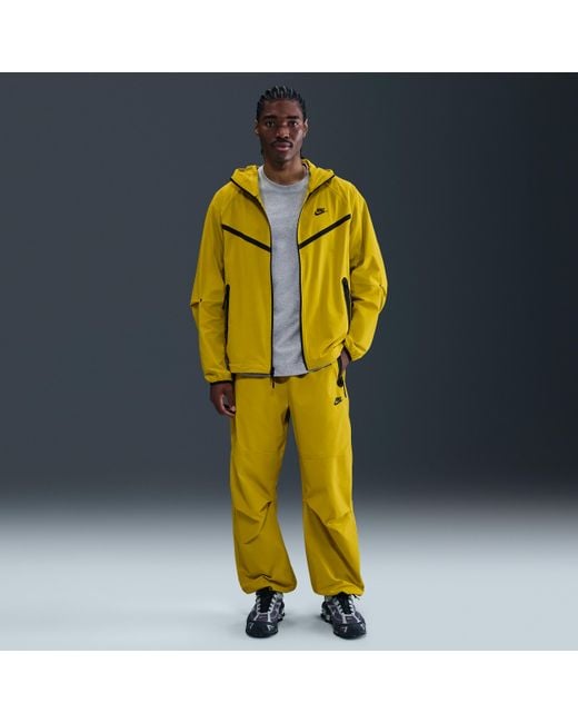 nike tech suit yellow