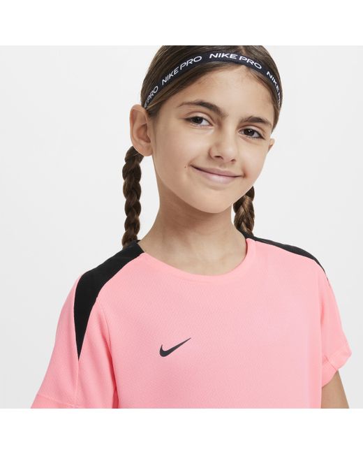 Maglia da calcio a manica corta dri-fit strike di Nike in Pink