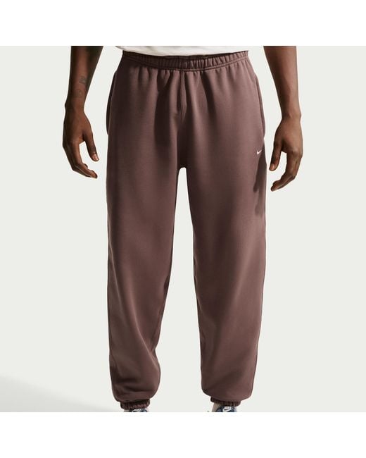 Nike Red Solo Swoosh Cuffed Fleece Pants for men