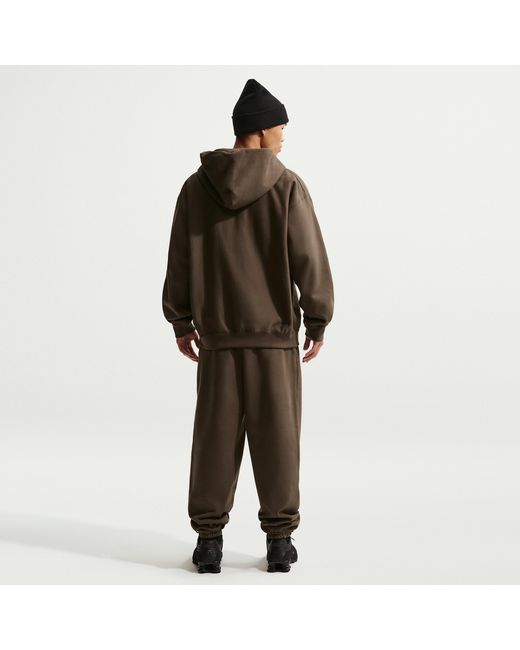 Nike Black Solo Swoosh Cuffed Fleece Pants for men