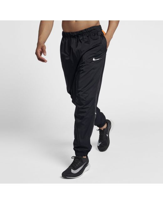 Nike Repel Track Trousers in Black for Men | Lyst UK