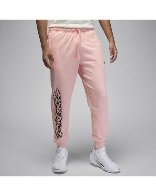 Pantaloni in fleece con grafica jordan dri-fit sport di Nike in Pink da Uomo