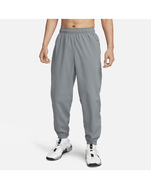Nike Gray Form Dri-fit Tapered Versatile Pants for men