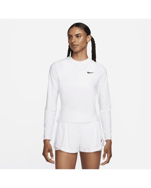 Capo midlayer da tennis con zip a 1/4 dri-fit court advantage di Nike in White