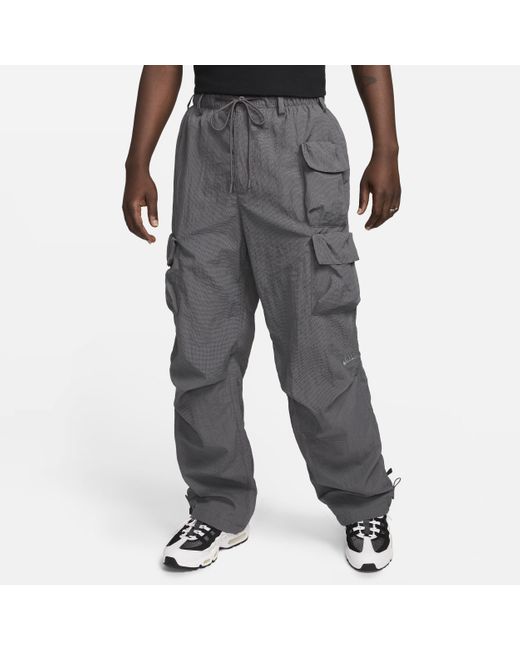 Pantaloni con fodera in tessuto sportswear tech pack di Nike in Gray da Uomo