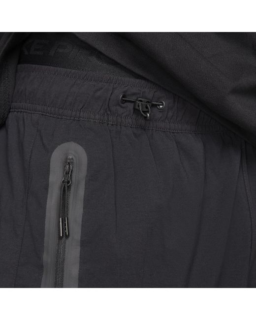 Nike Black Tech Woven Oversized Trousers for men