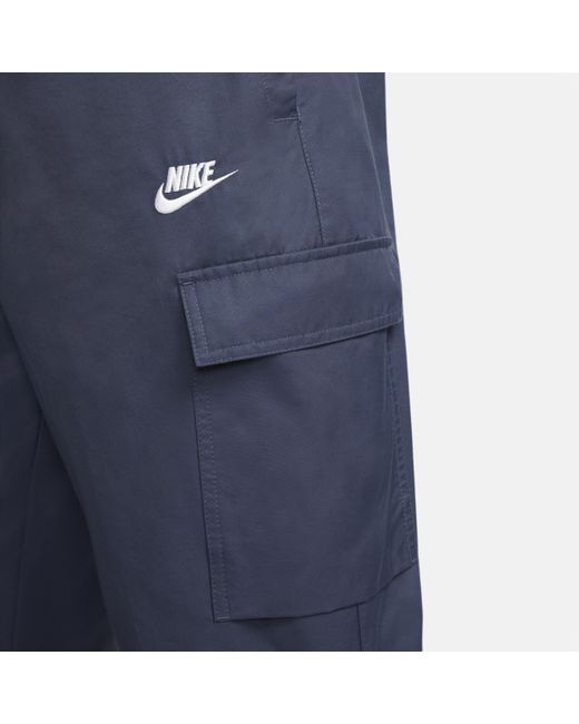Pantaloni in tessuto sportswear repeat di Nike in Blue da Uomo