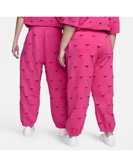 Pantaloni con swoosh x jacquemus di Nike in Pink