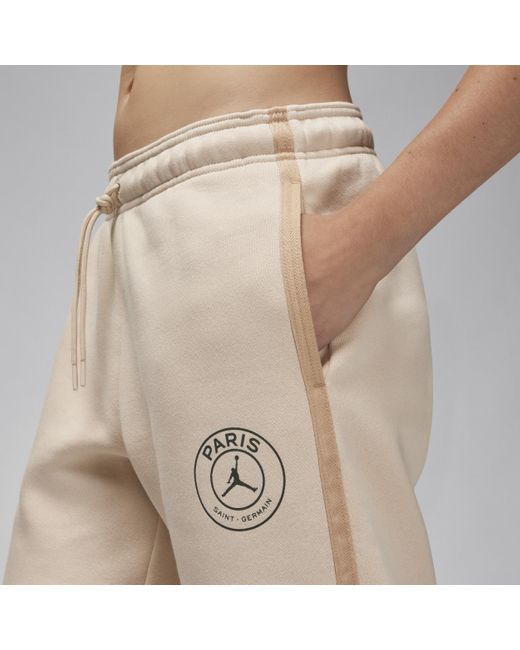 Pantaloni da calcio con grafica jordan paris saint-germain brooklyn fleece di Nike in Natural