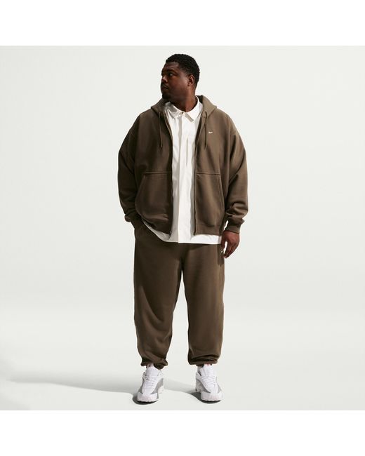 Nike Black Solo Swoosh Cuffed Fleece Pants for men