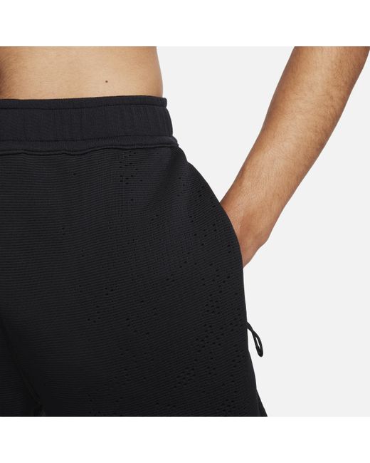 Pantaloni versatili a.p.s. therma-fit di Nike in Black da Uomo