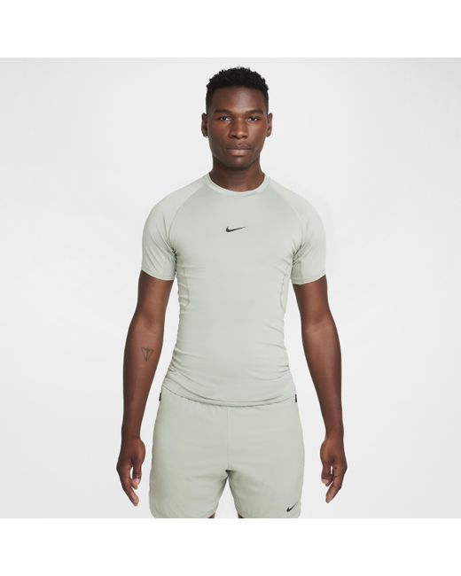 Nike Pro Dri-Fit Tight Short-Sleeve Fitness Top in White for