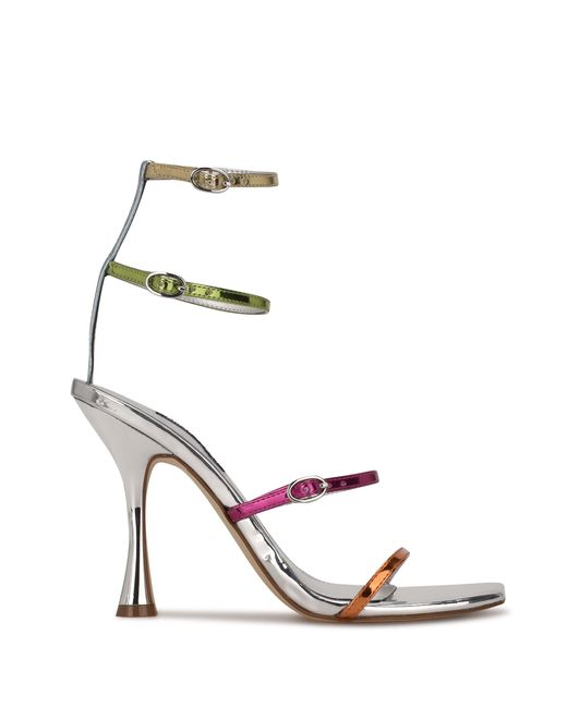 Get Your Shine On: Metallic is the new neutral. Strappy sandals in burnished suede and antiqued 