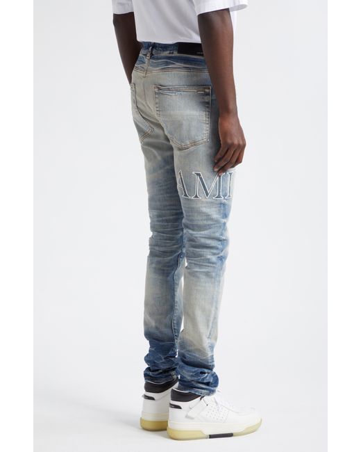 Amiri Blue Bandana Core Logo Distressed Stretch Denim Jeans for men
