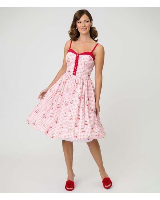 pink fifties dress Retro 50s Strapless Tea Length Prom Evening Dress Embrace your inner royalty in this breathtaking Fuchsia Pink Glitter Tulle Tiered Ball Gown Cavosen 1950 Dress Style Women
