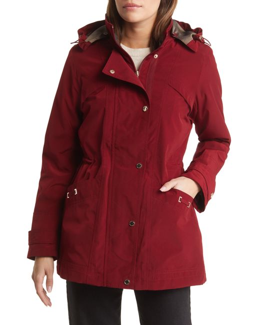 Gallery Cinched Waist Hooded Raincoat in Red | Lyst