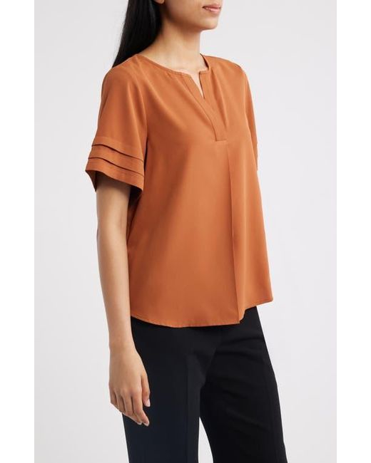 Anne Klein Orange Pleated Split Neck Top