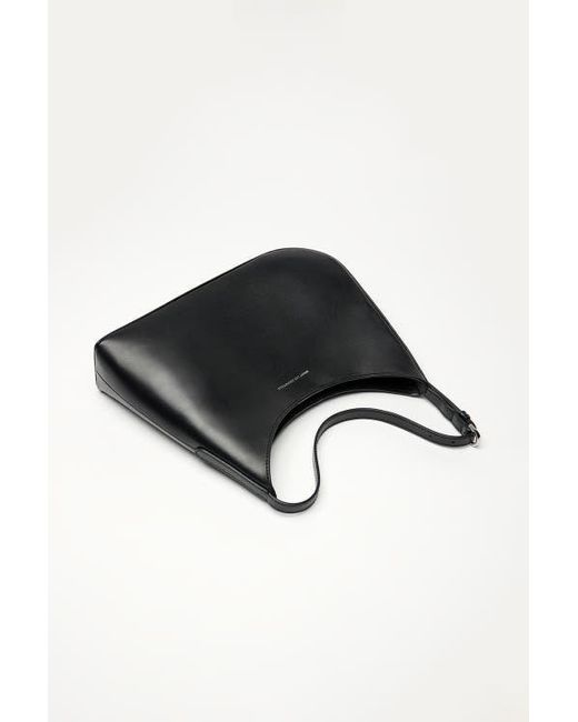 Want Les Essentiels De La Vie Black Arch Smooth Leather Shoulder Bag