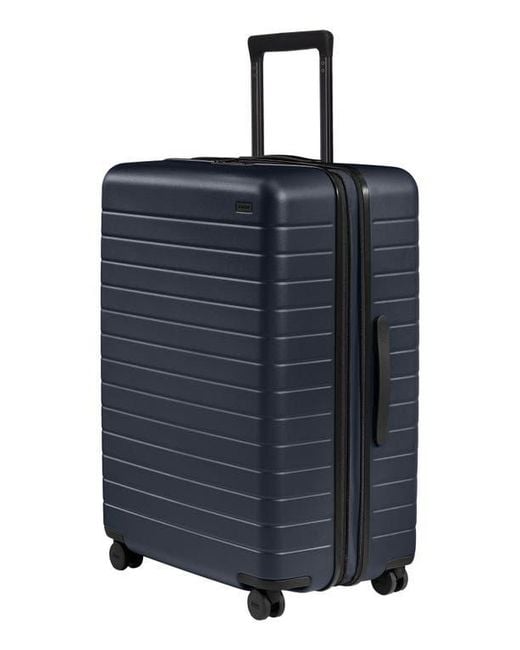 AWAY Blue The Large Flex Suitcase