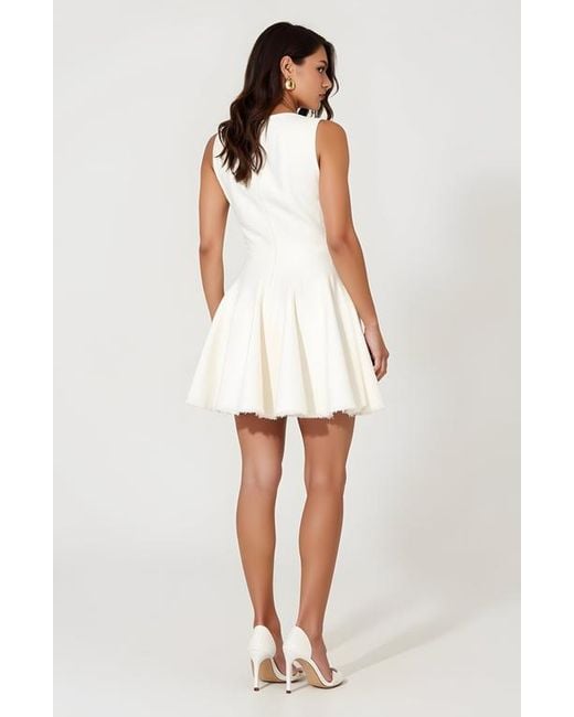 Modenaire White Sleeveless Fit And Flare Dress With Raw Edge Hem And Seam Detailing
