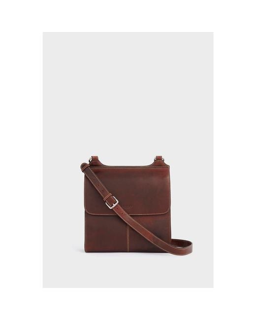 osprey brown leather crossbody bag Daylite Shoulder Sling Impeccably crafted in luxuriously supple grainy hide leather Womens Osprey London Red The