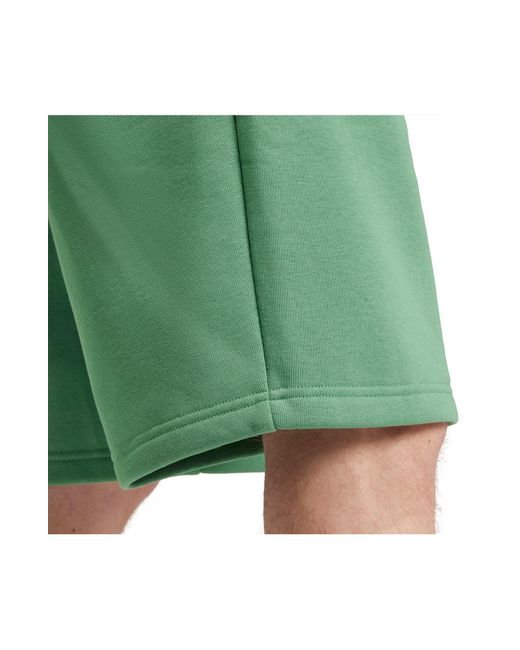 Adidas Originals Green Trefoil Essentials Sweat Shorts for men