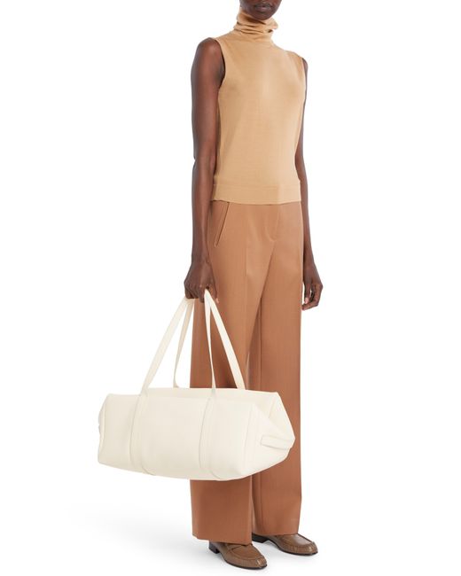 The Row Gio Leather Duffle Bag in Natural Lyst