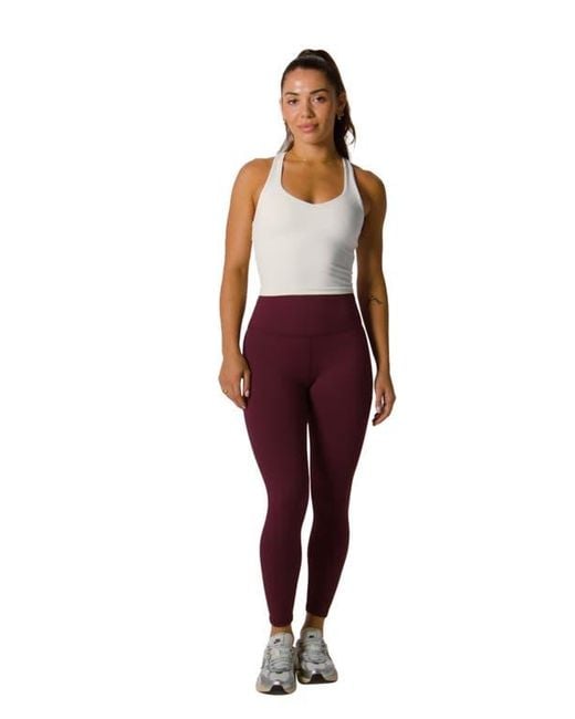 Fabletics Purple Define Powerhold High-Waisted 7/8 Leggings