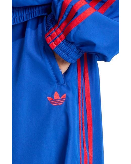 adidas Originals Firebird Adilenium Oversize Track Pants in Blue