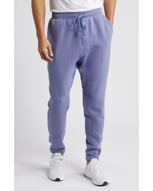 Alo Yoga Blue Triumph Sweatpants for men