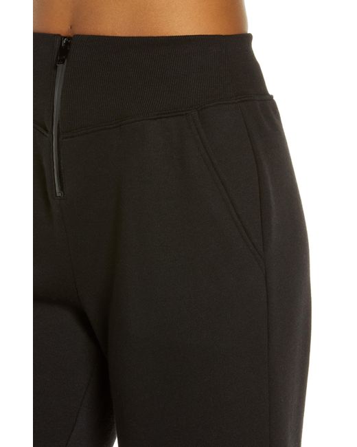 Alo Yoga Slick Zip Front Sweatpants in Black