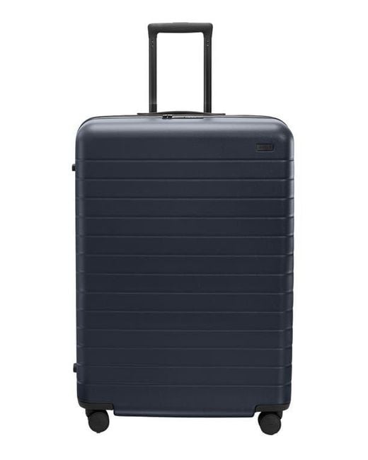 AWAY Blue The Large Flex Suitcase