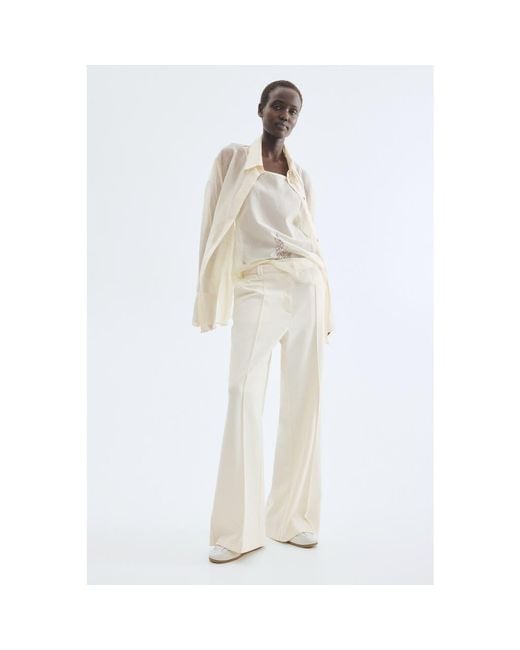 H&M Natural Flared Belted Trousers