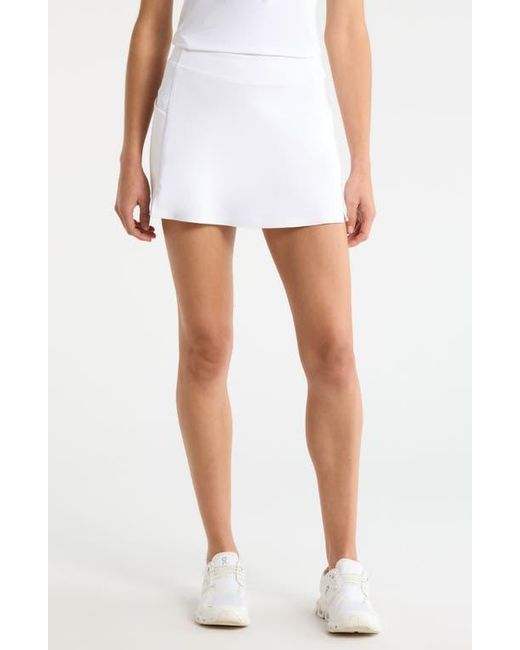 G/FORE White Knockout Mid Rise Scuba Knit Golf Skort