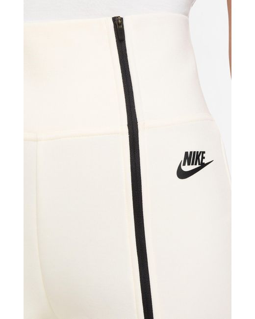 Nike Sportswear Tech Fleece Women's High-Waisted Slim Zip Pants.