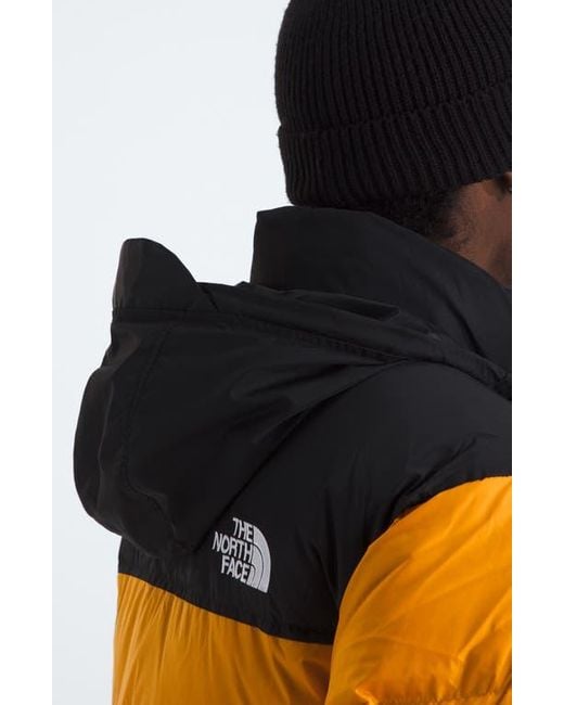 The North Face Orange 1996 Retro Nuptse 700 Fill Power Down Packable Jacket for men