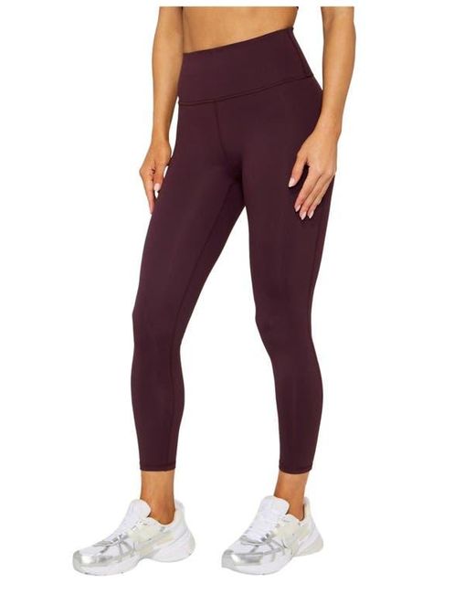 Fabletics Purple Define Powerhold High-Waisted 7/8 Leggings