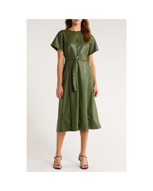green stretch velvet dress ULTRA LUX FAUX LEATHER MOCK NECK MINI DRESS IN LIME GREEN – AKIRA main image 1