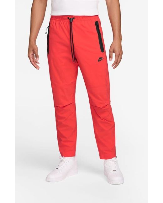 Nike Red Dri-Fit Tech Woven Pants for men