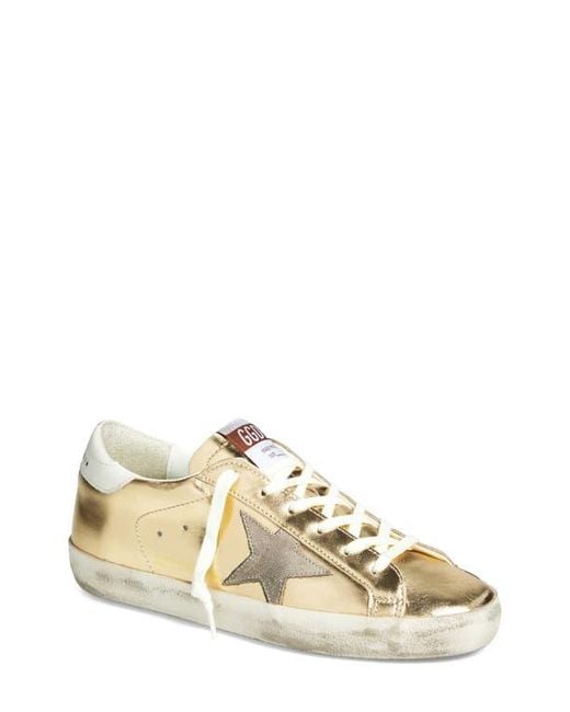 Golden Goose Super-Star Metallic Low Top Sneaker in Natural | Lyst