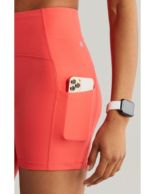 Zella Orange Studio Luxe Pocket Bike Shorts