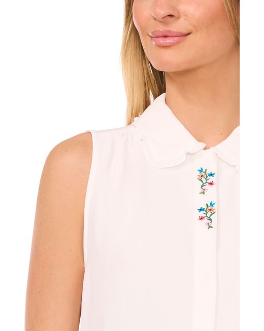 Cece Blue Embroidered Ruffle Collar Sleeveless Shirt