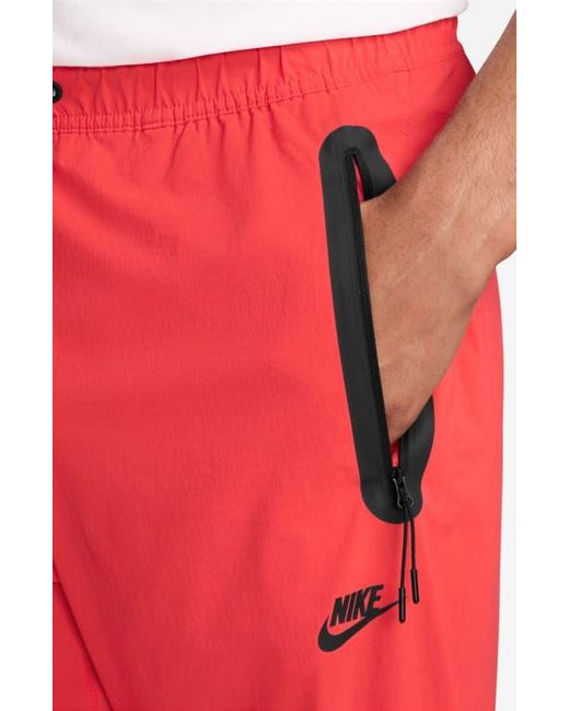 Nike Red Dri-Fit Tech Woven Pants for men